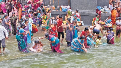 Nashik, India - July 13, 2015 : Devotees take bath at Ram Kund on the eve of the flag hoisting of Kumbh Mela at in Nashik, India, on Monday, July 13, 2015. (Photo by Arijit Sen/ Hindustan Times) (Hindustan Times) Nashik, India - July 13, 2015 : Devotees take bath at Ram Kund on the eve of the flag hoisting of Kumbh Mela at in Nashik, India, on Monday, July 13, 2015. (Photo by Arijit Sen/ Hindustan Times) (Hindustan Times)