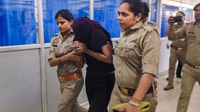 Ghazipur: Sonam Raghuvanshi, the Indore woman accused of plotting her husband's murder during their honeymoon in Meghalaya, being brought for medical examination at a hospital. (PTI file photo) Ghazipur: Sonam Raghuvanshi, the Indore woman accused of plotting her husband's murder during their honeymoon in Meghalaya, being brought for medical examination at a hospital. (PTI file photo)