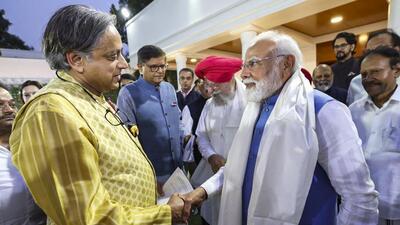 Prime Minister Narendra Modi greets Congress MP Shashi Tharoor as he meets members of the seven multi-party delegations at his residence in Delhi on Tuesday. (PTI) Prime Minister Narendra Modi greets Congress MP Shashi Tharoor as he meets members of the seven multi-party delegations at his residence in Delhi on Tuesday. (PTI)
