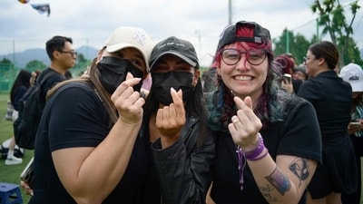 Fans of K-pop boy band BTS members RM and V pose at an outdoor sporting facility in Chuncheon on June 10, 2025, after the two band members were released from 18 months of South Korean military service. Hundreds of fans gathered near two army bases just outside of the capital Seoul where band leader RM -- recently named "Favorite K-pop Artist" at the American Music Awards -- and singer V were discharged. (AFP) Fans of K-pop boy band BTS members RM and V pose at an outdoor sporting facility in Chuncheon on June 10, 2025, after the two band members were released from 18 months of South Korean military service. Hundreds of fans gathered near two army bases just outside of the capital Seoul where band leader RM -- recently named "Favorite K-pop Artist" at the American Music Awards -- and singer V were discharged. (AFP)
