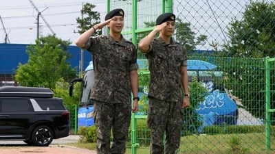 K-pop boy band BTS members RM (L) and V salute at an outdoor sporting facility in Chuncheon on June 10, 2025, after their release from 18 months of South Korean military service. Hundreds of fans gathered near two army bases just outside of the capital Seoul where band leader RM -- recently named "Favorite K-pop Artist" at the American Music Awards -- and singer V were discharged. (AFP) K-pop boy band BTS members RM (L) and V salute at an outdoor sporting facility in Chuncheon on June 10, 2025, after their release from 18 months of South Korean military service. Hundreds of fans gathered near two army bases just outside of the capital Seoul where band leader RM -- recently named "Favorite K-pop Artist" at the American Music Awards -- and singer V were discharged. (AFP)