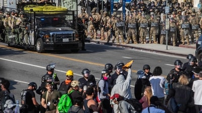 Los Angeles Police Department officers (LAPD) and Los Angeles Sheriff Department (LASD) clash with demontrators in Los Angeles, on June 9, 2025. (AFP) Los Angeles Police Department officers (LAPD) and Los Angeles Sheriff Department (LASD) clash with demontrators in Los Angeles, on June 9, 2025. (AFP)