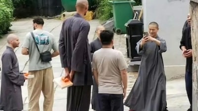 In the now-viral image, the San Antonio Spurs player is seen with a shaved head at a temple in the Henan province, as per China Daily. (X/@SpursGDP) In the now-viral image, the San Antonio Spurs player is seen with a shaved head at a temple in the Henan province, as per China Daily. (X/@SpursGDP)