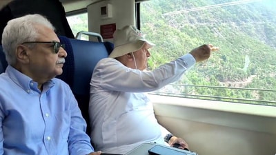 National Conference chief Farooq Abdullah travels on the Vande Bharat train from Nowgam Railway Station to Katra, in Srinagar on Tuesday. (ANI grab) National Conference chief Farooq Abdullah travels on the Vande Bharat train from Nowgam Railway Station to Katra, in Srinagar on Tuesday. (ANI grab)