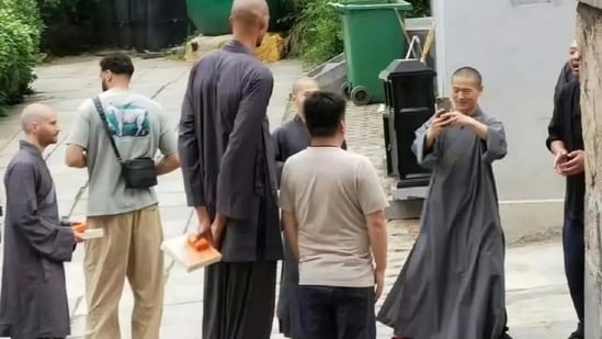 In the now-viral image, the San Antonio Spurs player is seen with a shaved head at a temple in the Henan province, as per China Daily. (X/@SpursGDP)