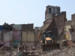 Demolition drive at Kalkaji's Bhoomihin Camp on Wednesday. Demolition drive at Kalkaji's Bhoomihin Camp on Wednesday.
