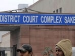 CCTV footage captured a verbal altercation between the three around 10am—shortly after they arrived at the complex at 9.30am—before the assault began. (AFP)