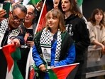 Greta Thunberg is greeted on arrival at Stockholm-Arlanda airport, on the outskirts of Stockholm, on June 10, 2025 after being deported by Israel.
