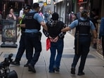 Protesters, including immigration rights and pro-Palestinian activists, united to demand an end to ICE raids, chanting solidarity slogans during the march. (Photo by SCOTT OLSON / GETTY IMAGES NORTH AMERICA / Getty Images via AFP) Protesters, including immigration rights and pro-Palestinian activists, united to demand an end to ICE raids, chanting solidarity slogans during the march. (Photo by SCOTT OLSON / GETTY IMAGES NORTH AMERICA / Getty Images via AFP)