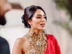 Sobhita Dhulipala looked stunning in a red saree at the reception.