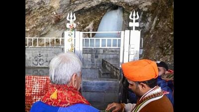 Jammu and Kashmir lieutenant governor Manoj Sinha performing ‘pratham puja’ at the Amarnath cave shrine, marking the ceremonial beginning of the annual yatra (pilgrimage) in Anantnag on Wednesday. (ANI Photo) Jammu and Kashmir lieutenant governor Manoj Sinha performing ‘pratham puja’ at the Amarnath cave shrine, marking the ceremonial beginning of the annual yatra (pilgrimage) in Anantnag on Wednesday. (ANI Photo)