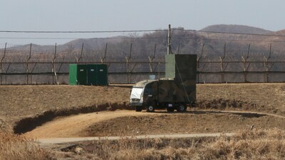 A South Korean military vehicle with loudspeakers is seen in front of the barbed-wire fence in Paju, near the border with North Korea, on Feb. 15, 2018. (AP) A South Korean military vehicle with loudspeakers is seen in front of the barbed-wire fence in Paju, near the border with North Korea, on Feb. 15, 2018. (AP)