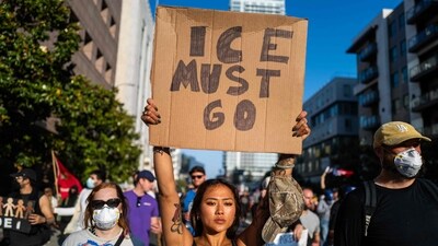 Protesters move through downtown in Los Angeles during continuing protests following raids by Immigration and Customs Enforcement (ICE) that began last Friday. (AFP) Protesters move through downtown in Los Angeles during continuing protests following raids by Immigration and Customs Enforcement (ICE) that began last Friday. (AFP)