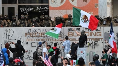 An overnight curfew went into effect in protest-hit downtown Los Angeles on June 10, with Mayor Karen Bass earlier saying it was to "stop the vandalism, to stop the looting" after several days of unrest. (AFP) An overnight curfew went into effect in protest-hit downtown Los Angeles on June 10, with Mayor Karen Bass earlier saying it was to "stop the vandalism, to stop the looting" after several days of unrest. (AFP)