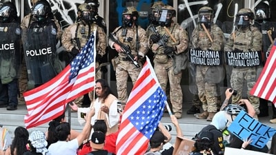 The California raids have triggered days of turbulent protests across the city with President Donald Trump deploying National Guard troops and Marines to the LA area (AFP) The California raids have triggered days of turbulent protests across the city with President Donald Trump deploying National Guard troops and Marines to the LA area (AFP)