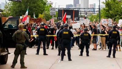 Protesters are gathering in cities across the nation to denounce the Trump administration's ICE raids. (Photo by Michael Ciaglo / GETTY IMAGES NORTH AMERICA / Getty Images via AFP) (Getty Images via AFP) Protesters are gathering in cities across the nation to denounce the Trump administration's ICE raids. (Photo by Michael Ciaglo / GETTY IMAGES NORTH AMERICA / Getty Images via AFP) (Getty Images via AFP)
