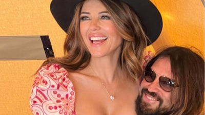 Billy Ray Cyrus posted a picture with Liz Hurley on her 60th birthday. Billy Ray Cyrus posted a picture with Liz Hurley on her 60th birthday.