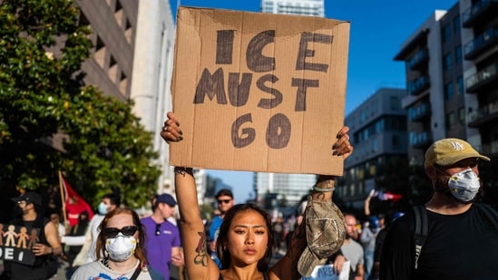Protesters move through downtown in Los Angeles during continuing protests following raids by Immigration and Customs Enforcement (ICE) that began last Friday.&nbsp;(AFP)