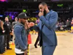 LeBron James in conversation with his agent Rich Paul at the sidelines of a Lakers game. LeBron James in conversation with his agent Rich Paul at the sidelines of a Lakers game.