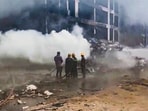 Firefighting team at the spot after an Air India plane crashed in Meghaninagar area, near Ahmedabad airport, Thursday, June 12, 2025.