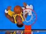 Indiana Pacers guard Bennedict Mathurin (00) looks up at his shot during the second half during game one of the 2025 NBA Finals at Paycom Center. Mandatory Credit: Julio Cortez-Pool Photo via Imagn Images