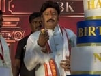 Balakrishna cut a three-tiered birthday cake and was spotted flipping the knife. 