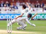 Pat Cummins crashes into Kyle Verreynne of South Africa mid-appeal. Cummins would take the DRS review for this ball, with the wicketkeeper judged out on review.