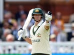 Australia's Steve Smith celebrates after reaching his half century