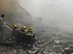 Fire and Emergency Services personnel at work following the Air India plane crash in Ahmedabad, on Thursday. (PTI) Fire and Emergency Services personnel at work following the Air India plane crash in Ahmedabad, on Thursday. (PTI)