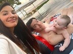 John Mulaney with is baby son and wife Olivia Munn on Father's Day. John Mulaney with is baby son and wife Olivia Munn on Father's Day.