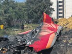 People near the debris of the Air India plane that crashed moments after taking off from the airport, in Ahmedabad, on Thursday. People near the debris of the Air India plane that crashed moments after taking off from the airport, in Ahmedabad, on Thursday.
