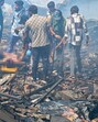 The scene of the plane crash near the Ahmedabad airport. (PTI) The scene of the plane crash near the Ahmedabad airport. (PTI)
