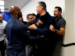 U.S. Senator Alex Padilla (D-CA), who interrupted the press conference held by U.S. Secretary of Homeland Security Kristi Noem, is removed from the venue, in Los Angeles, California, U.S., June 12, 2025.