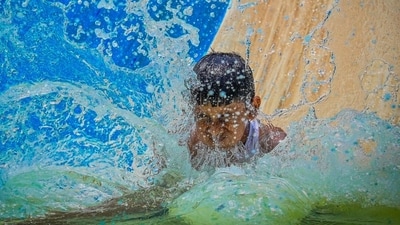 A child at a water park in the city as the maximum temperature touched 43.9°C on Thursday. (Sanchit Khanna/HT Photo) A child at a water park in the city as the maximum temperature touched 43.9°C on Thursday. (Sanchit Khanna/HT Photo)