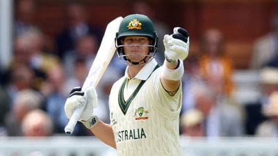 Australia's Steve Smith celebrates after reaching his half century (Action Images via Reuters)