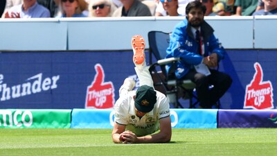 Beau Webster completes a phenomenal catch diving forward to wrap up South Africa's first innings. Australia secured a 74-run first innings advantage, taking control of the match at Lord's. (Action Images via Reuters)