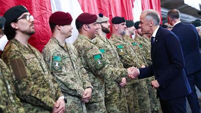 Canadian Prime Minister Mark Carney greets troops of the 4th Canadian Division as he attends a tour of the Fort York Armoury in Toronto on June 9. (AFP) Canadian Prime Minister Mark Carney greets troops of the 4th Canadian Division as he attends a tour of the Fort York Armoury in Toronto on June 9. (AFP)