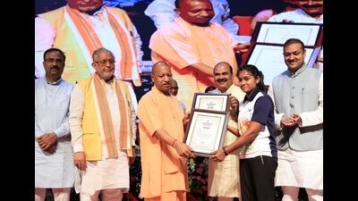 Chief minister Yogi Adityanath during a programme organised to felicitate meritorious students who scored high marks in board exams and for distribution of Mukhyamantri Vidyalayi Khel Puraskar, in Lucknow on Thursday. (PTI) Chief minister Yogi Adityanath during a programme organised to felicitate meritorious students who scored high marks in board exams and for distribution of Mukhyamantri Vidyalayi Khel Puraskar, in Lucknow on Thursday. (PTI)