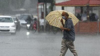 Mumbai, India - Aug. 11, 2020:A man walk with umbrella as it rain at Dadar in Mumbai, India, on Tuesday, August 11, 2020. (Photo by Satish Bate/Hindustan Times) (Satish Bate/HT Photo)