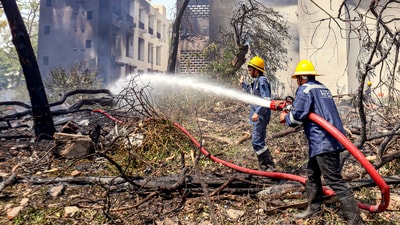 There was no official estimate of those killed or injured. There were fears that some in Meghaninagar could be among those who lost their lives. (PTI) There was no official estimate of those killed or injured. There were fears that some in Meghaninagar could be among those who lost their lives. (PTI)