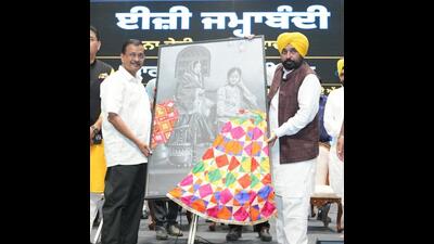 Punjab chief minister Bhagwant Singh Mann and Aam Aadmi Party (AAP) national convener Arvind Kejriwal during the launch of the Easy Jamabandi portal at Guru Nanak Dev University (GNDU) campus in Amritsar on Thursday. (HT Photo) Punjab chief minister Bhagwant Singh Mann and Aam Aadmi Party (AAP) national convener Arvind Kejriwal during the launch of the Easy Jamabandi portal at Guru Nanak Dev University (GNDU) campus in Amritsar on Thursday. (HT Photo)