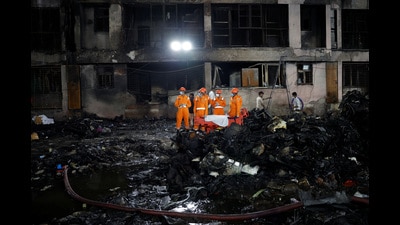 Rescue personnel stand next to the wreckage of an Air India aircraft, bound for London's Gatwick Airport, which crashed during take-off from an airport in Ahmedabad. (REUTERS) Rescue personnel stand next to the wreckage of an Air India aircraft, bound for London's Gatwick Airport, which crashed during take-off from an airport in Ahmedabad. (REUTERS)