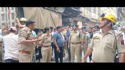 Rescue work on at Kinari Bazar in Agra where a fire erupted on Thursday afternoon (HT Photo) Rescue work on at Kinari Bazar in Agra where a fire erupted on Thursday afternoon (HT Photo)