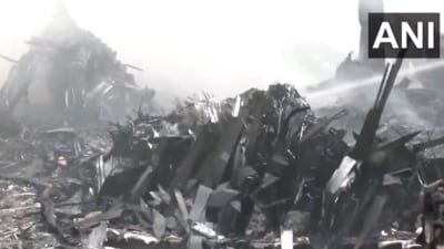 Ahmedabad plane crash: Fire brigade personnel were seen dousing the fire at the crash site