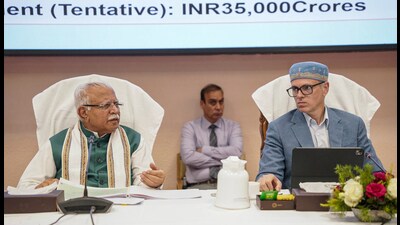 Union minister Manohar Lal Khattar with Jammu and Kashmir chief minister Omar Abdullah during a review meeting related to the power and housing projects in Srinagar on Thursday. (ANI) Union minister Manohar Lal Khattar with Jammu and Kashmir chief minister Omar Abdullah during a review meeting related to the power and housing projects in Srinagar on Thursday. (ANI)
