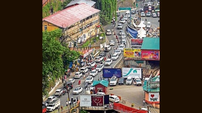 Vehicles stuck in a traffic jam amid heavy tourist inflow in Shimla on Thursday. (PTI) Vehicles stuck in a traffic jam amid heavy tourist inflow in Shimla on Thursday. (PTI)