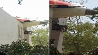 The visuals shows part of the plane's fuselage piercing a building. (X/PTI_News)