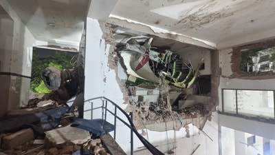 The plane crashed into the mess of a government-run medical college, leading to further casualties. A total death toll is yet to be provided. (Raju Shinde/Hindustan Times) The plane crashed into the mess of a government-run medical college, leading to further casualties. A total death toll is yet to be provided. (Raju Shinde/Hindustan Times)