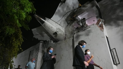 Parts of the plane were lodged into the building. Only one person, a British national of Indian origin, has survived the crash (Raju Shinde/Hindustan Times) Parts of the plane were lodged into the building. Only one person, a British national of Indian origin, has survived the crash (Raju Shinde/Hindustan Times)