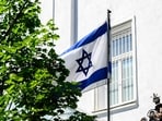 The Israeli flag flutters in front of the Israeli embassy in Vienna on June 13, 2025.